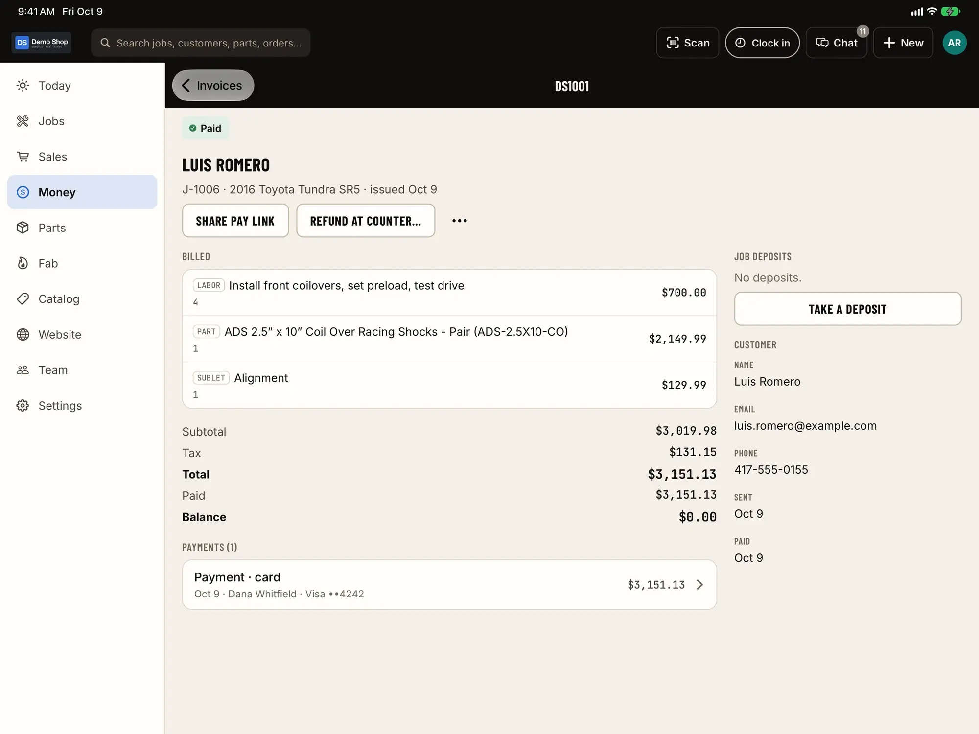 Invoice on iPad: A paid invoice with lines, tax, payment and customer details.